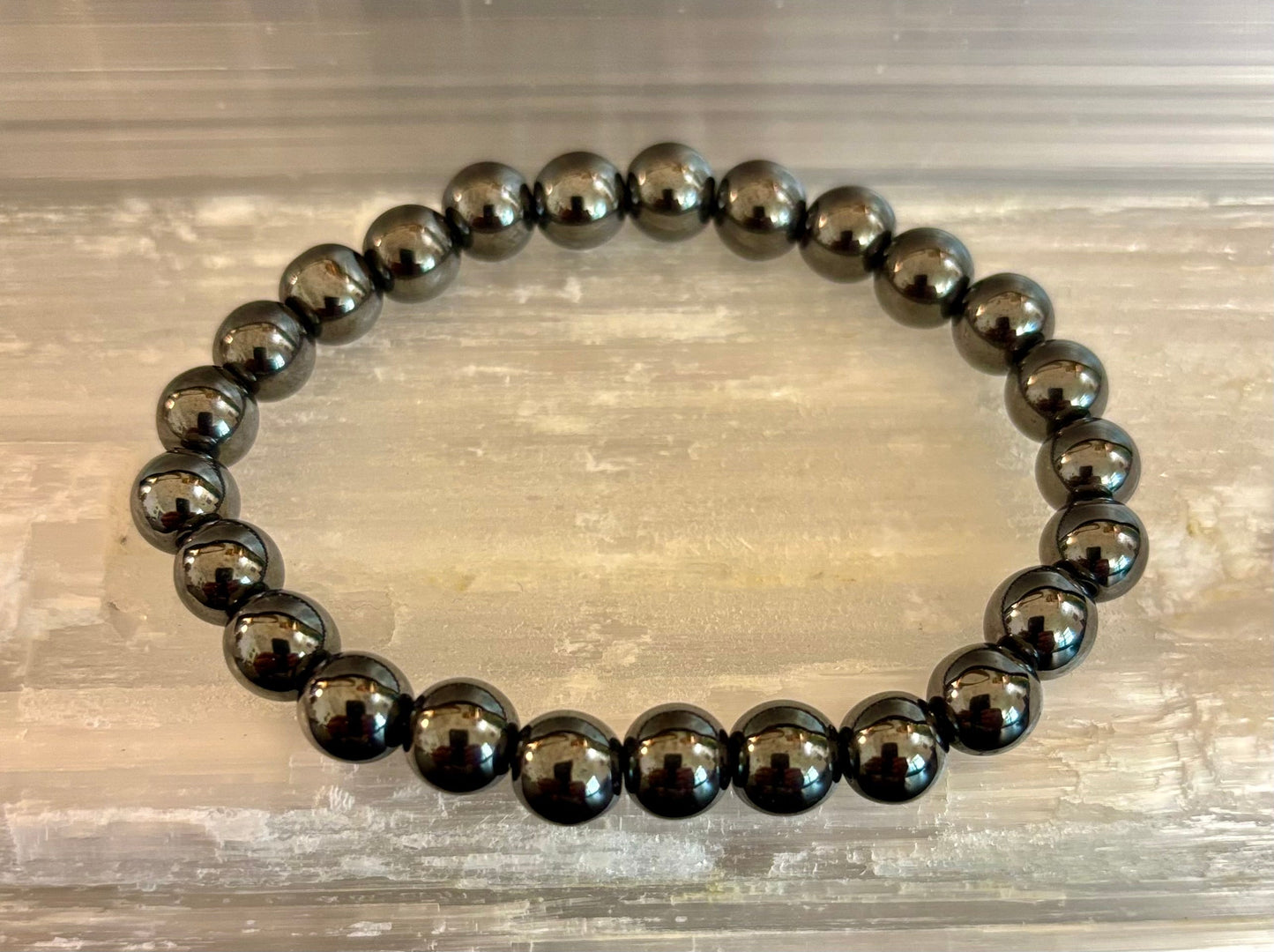 Hematite Grounding & Protection Bracelet β Root Chakra Healing Stone for Confidence, Clarity & Stability (6mm, 8mm, 10mm Options)