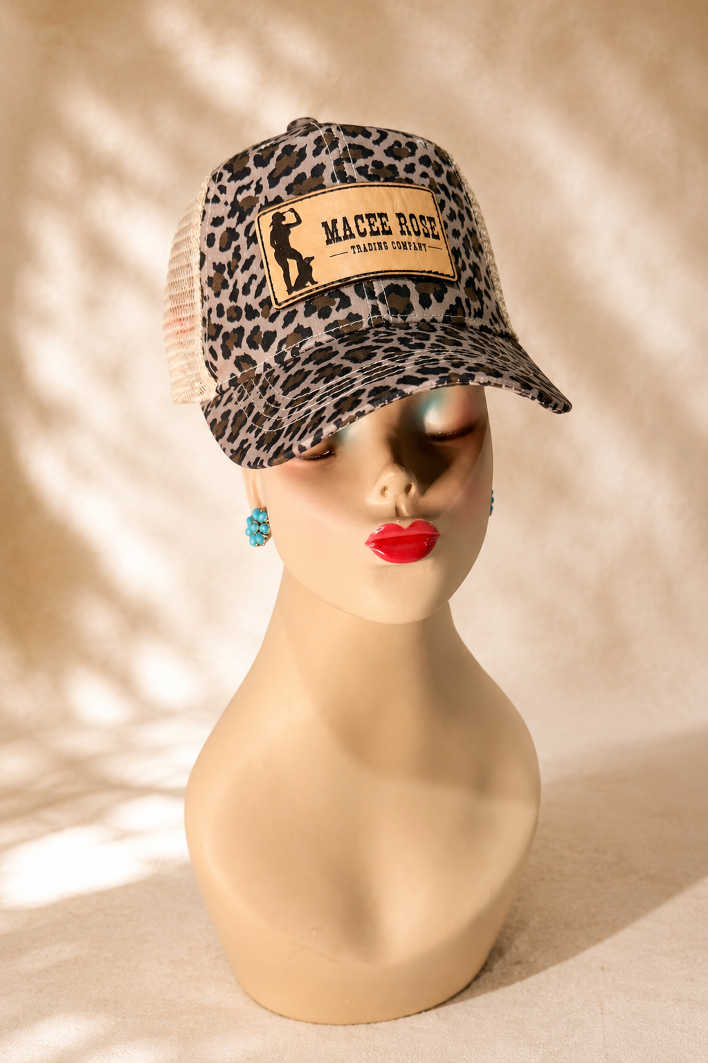 Macee Rose Leopard Ponytail Trucker Hat